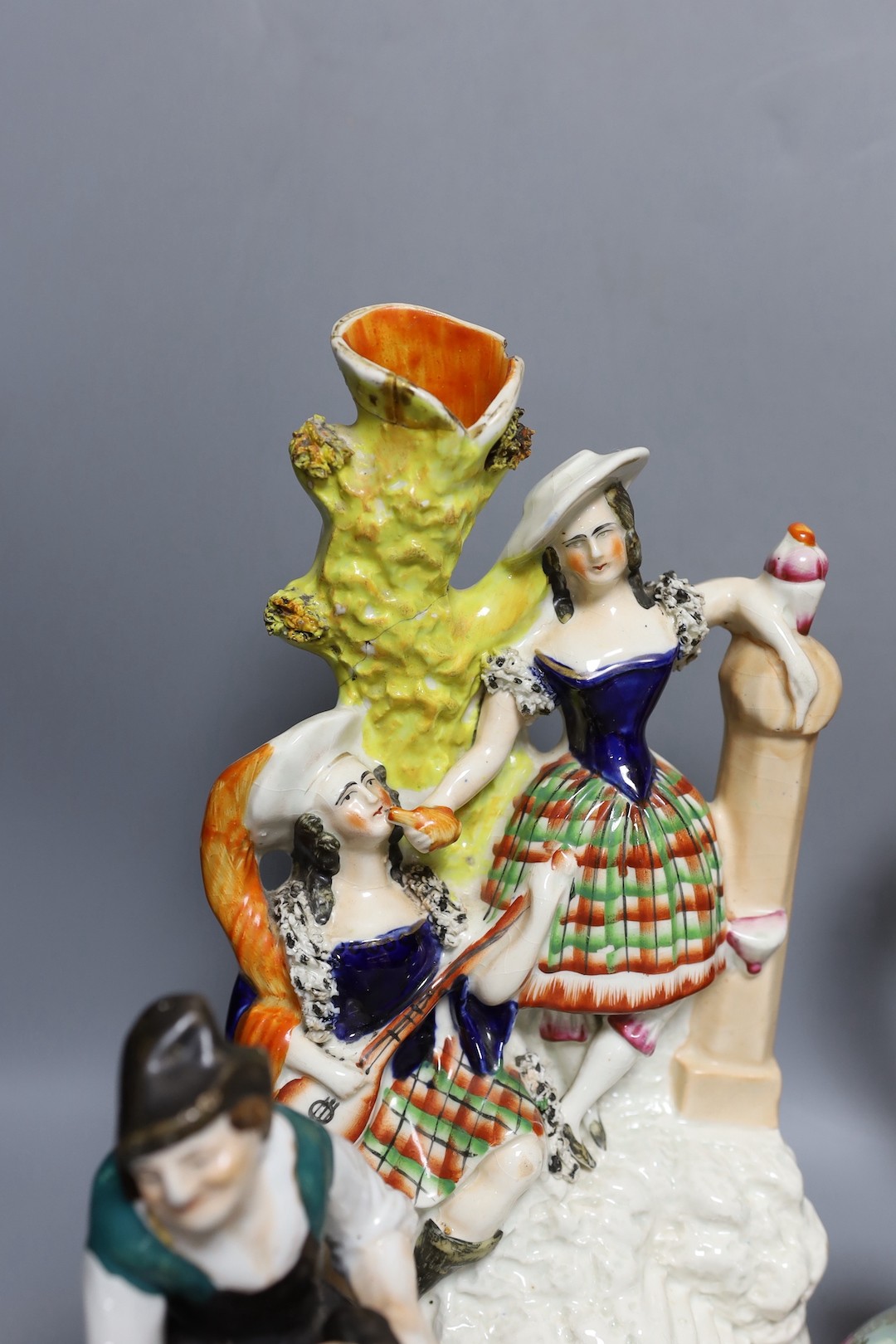 A Victorian Staffordshire flatback group, a pair of Staffordshire figures, an inkwell and a Japanese kutani coffee pot 32cm